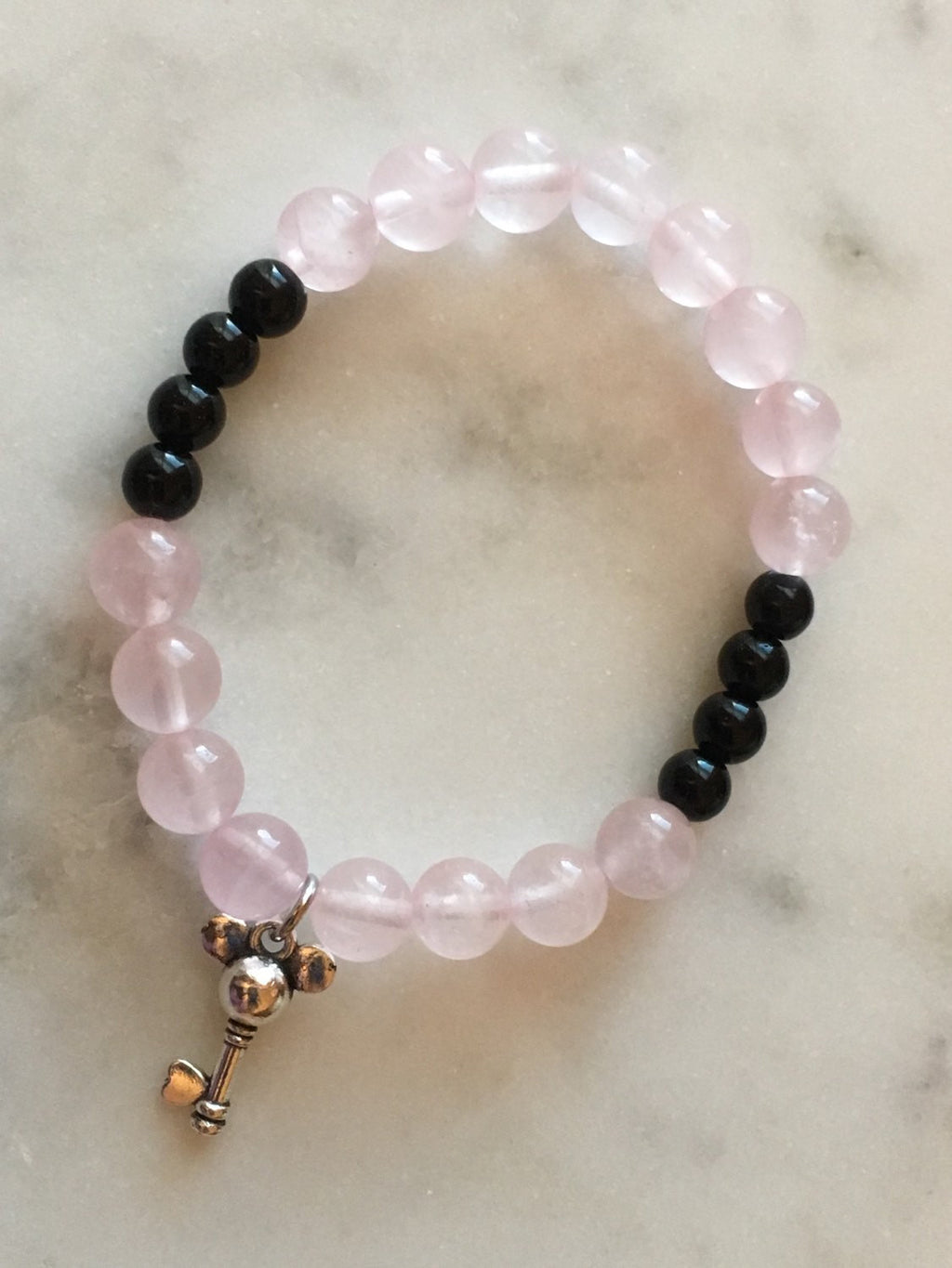 Rose Quartz and Black Rhombus Charm Bracelet
